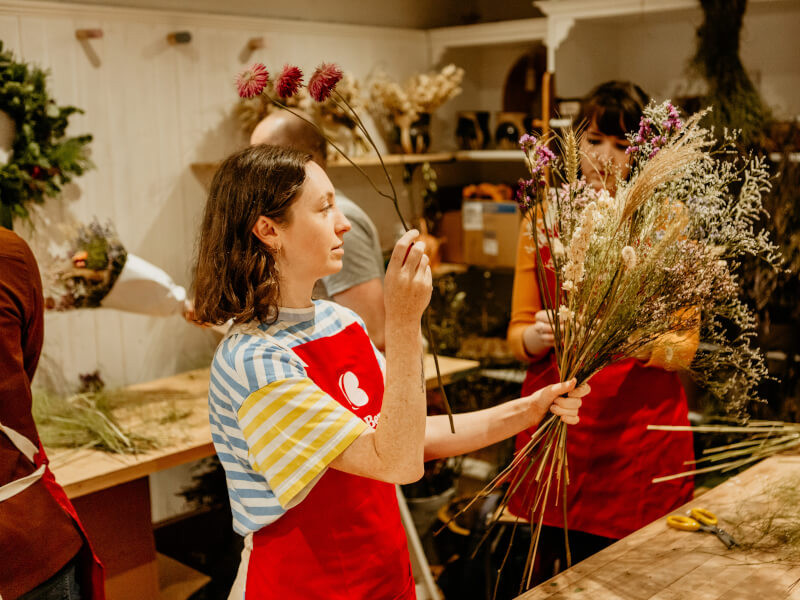 A woman flower arranging in London.